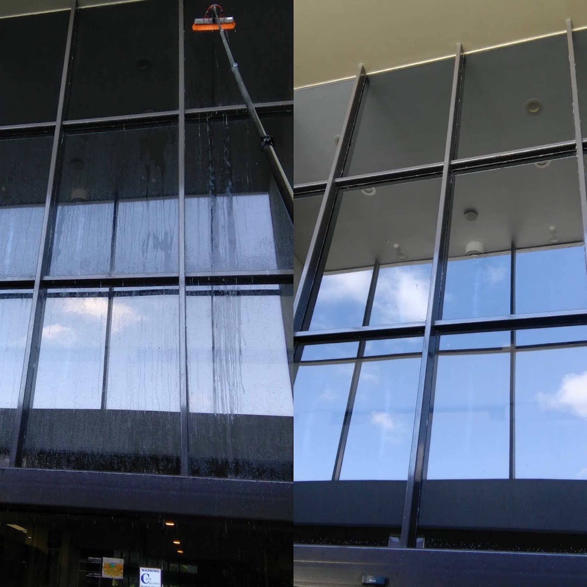 The angled glass curtain wall of a commercial building
